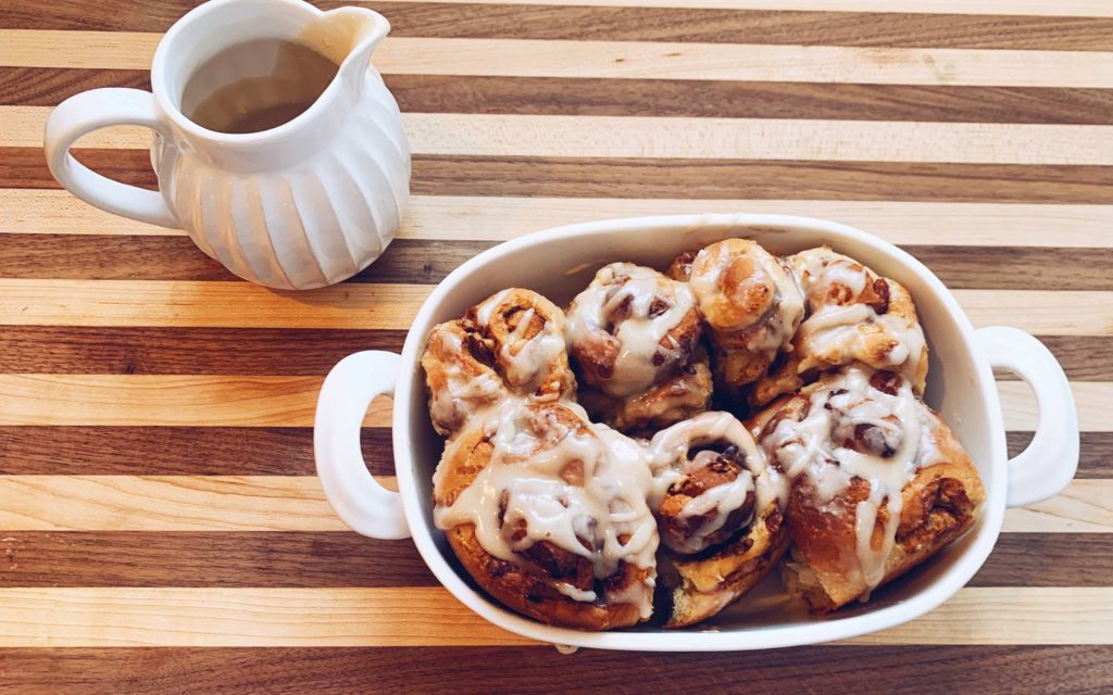 unbaked cinnamon rolls in a pan