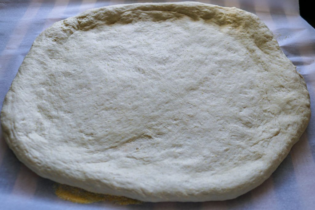 rolled out sourdough pizza crust