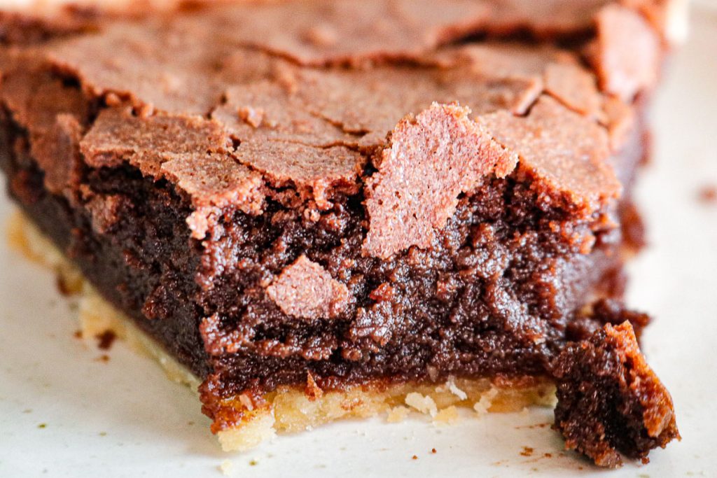 a piece of chocolate pie that's been cut into 