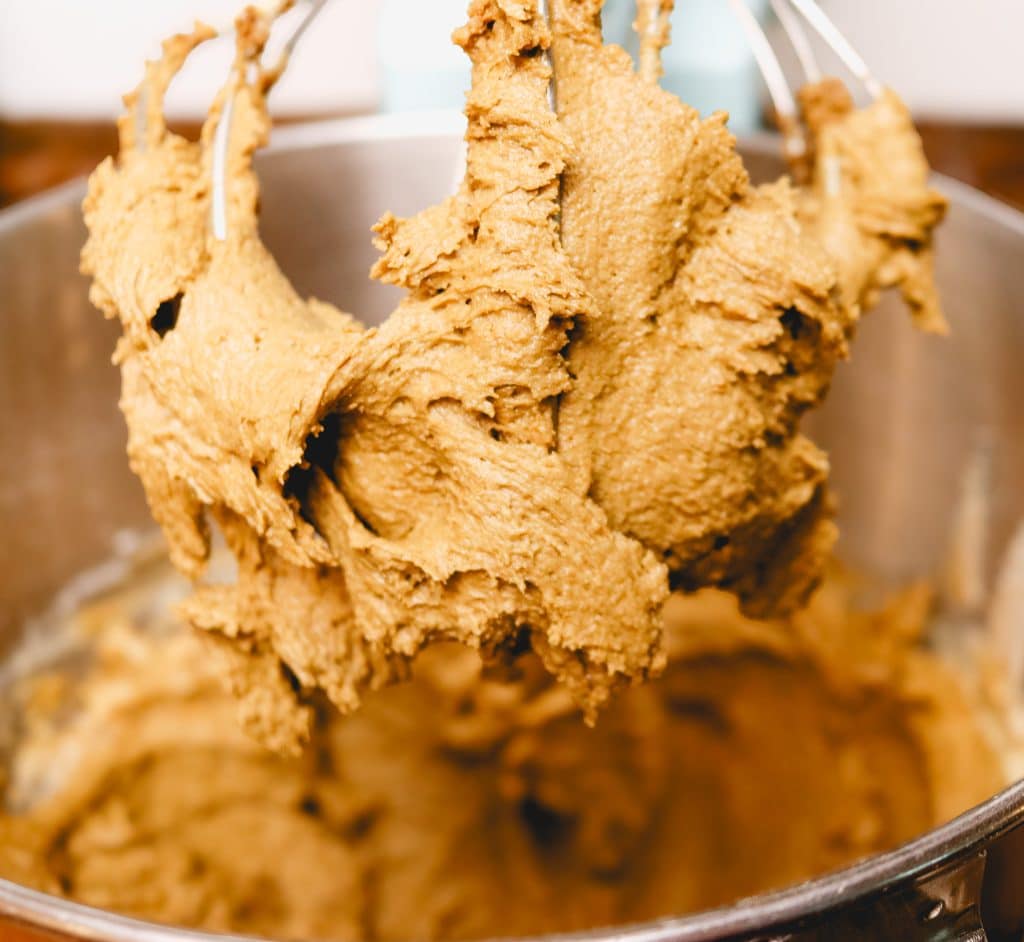 picture of stand mixer whisk with ginger cookie dough