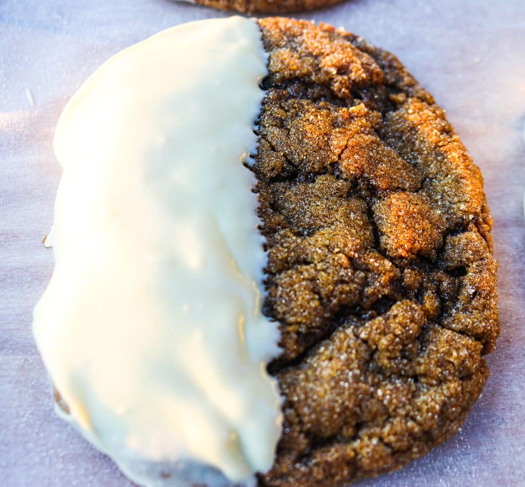 picture of ginger cookie dipped in white chocolate on one side