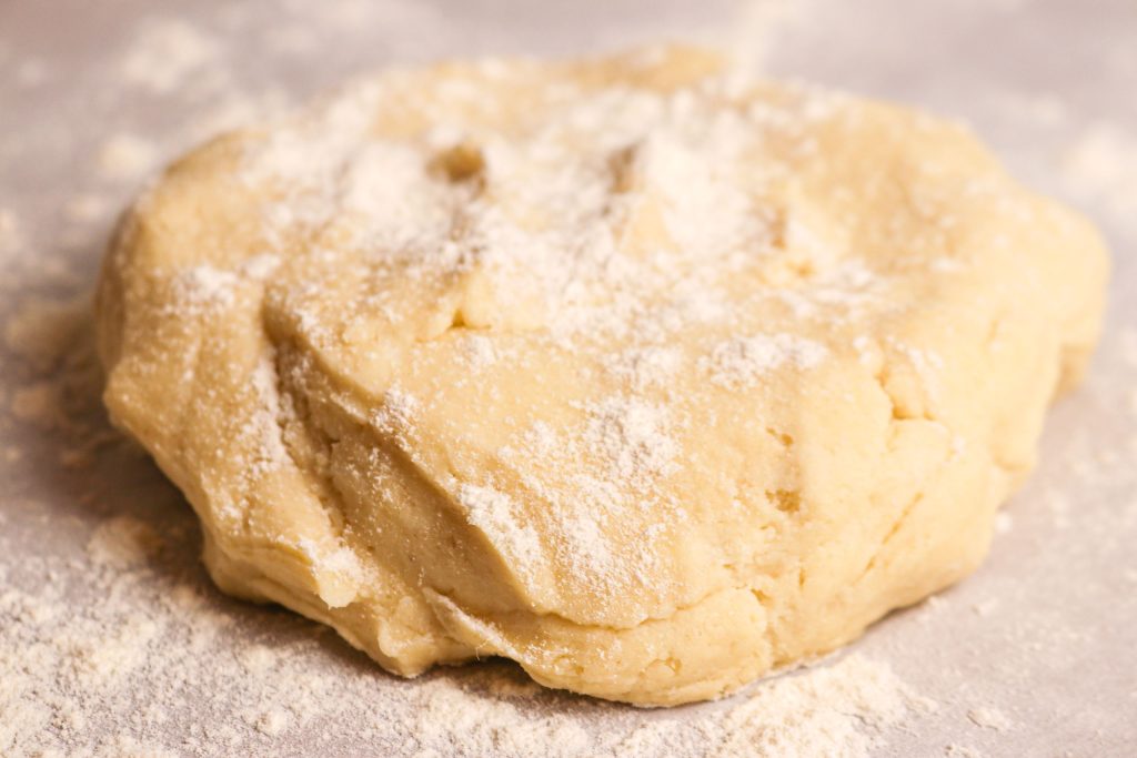 pie dough sprinkled with flour