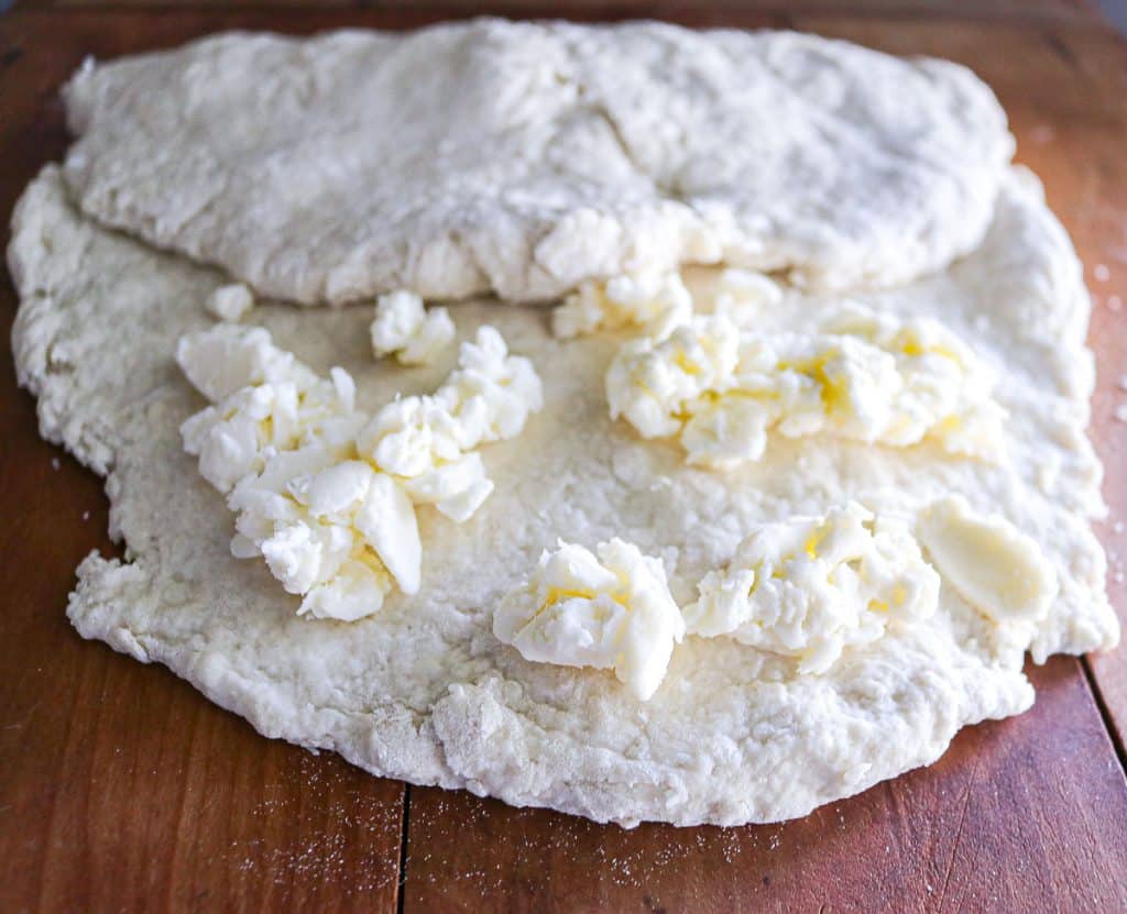 Grated butter layered into sourdough biscuit dough using a butter block method.