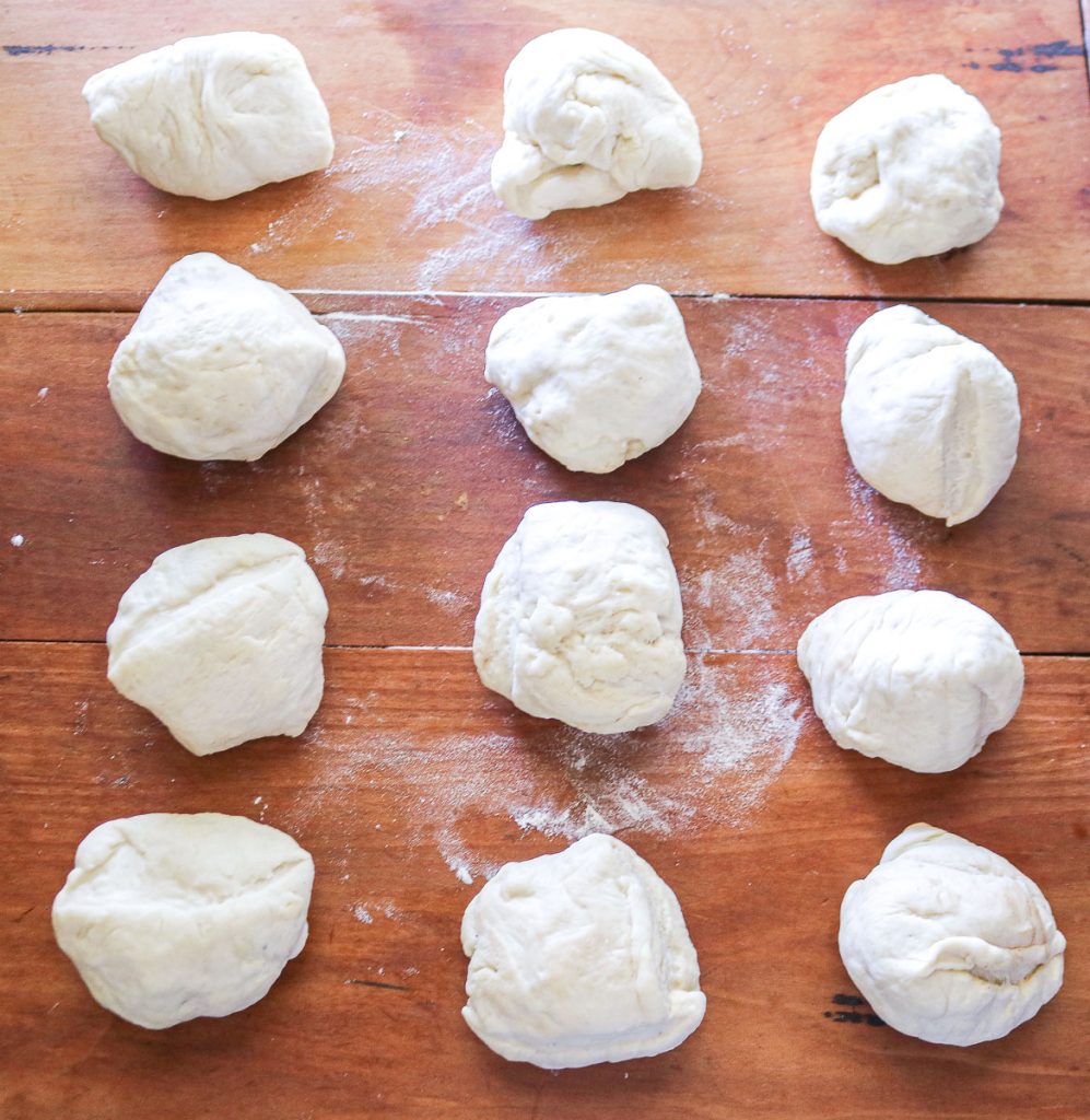 12 pieces of equal sized bread dough