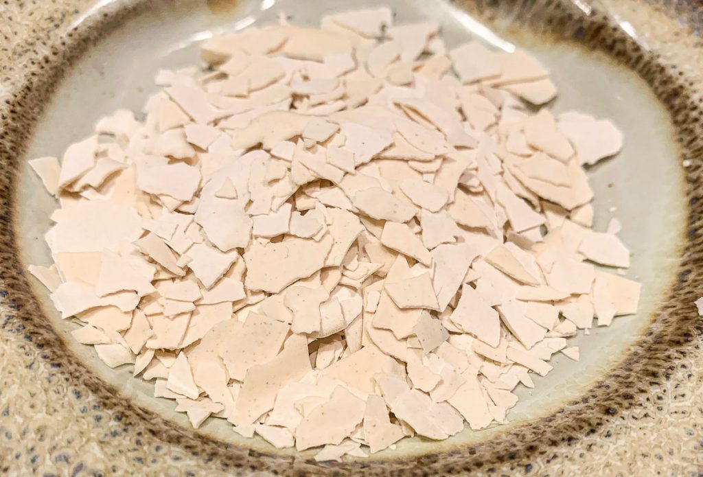 dehydrated sourdough starter on an off white plate