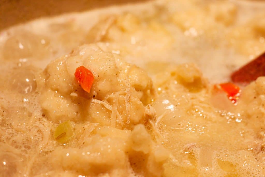 chicken and dumplings and carrot boiling