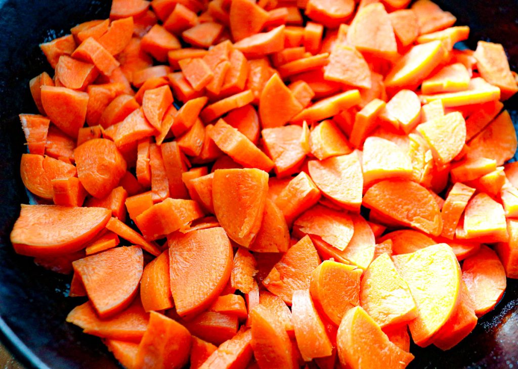 cut carrots in a cast iron skillet