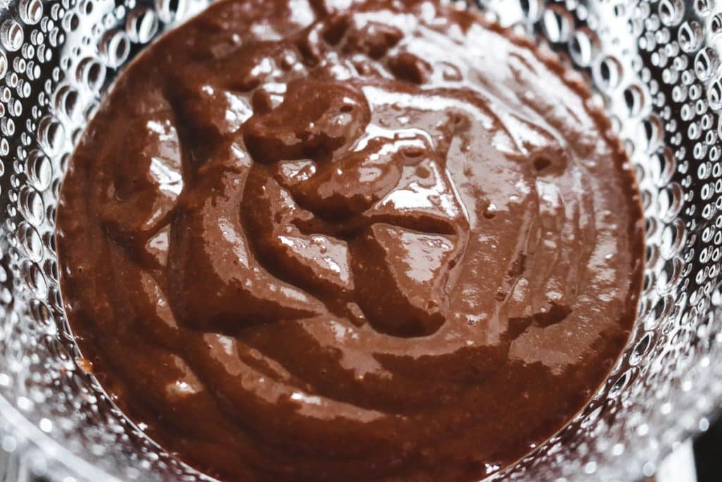 chocolate pudding in a clear bowl