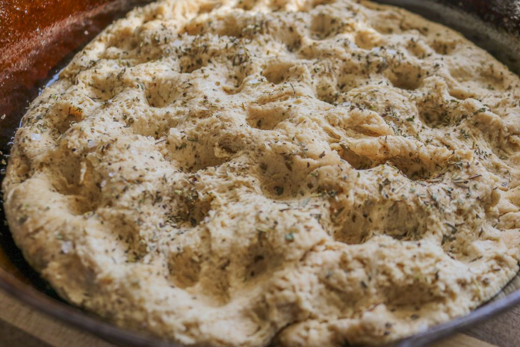 upclose unbaked sourdough focaccia
