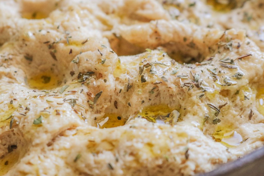 dimpled sourdough focaccia with olive oil