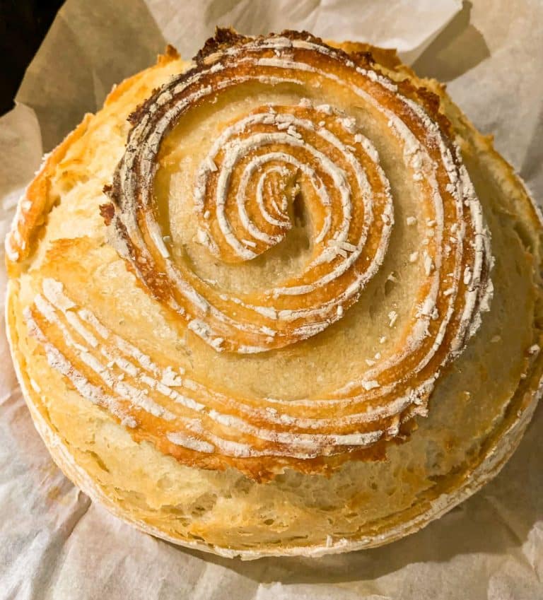 sourdough boule cut in a spiral pattern