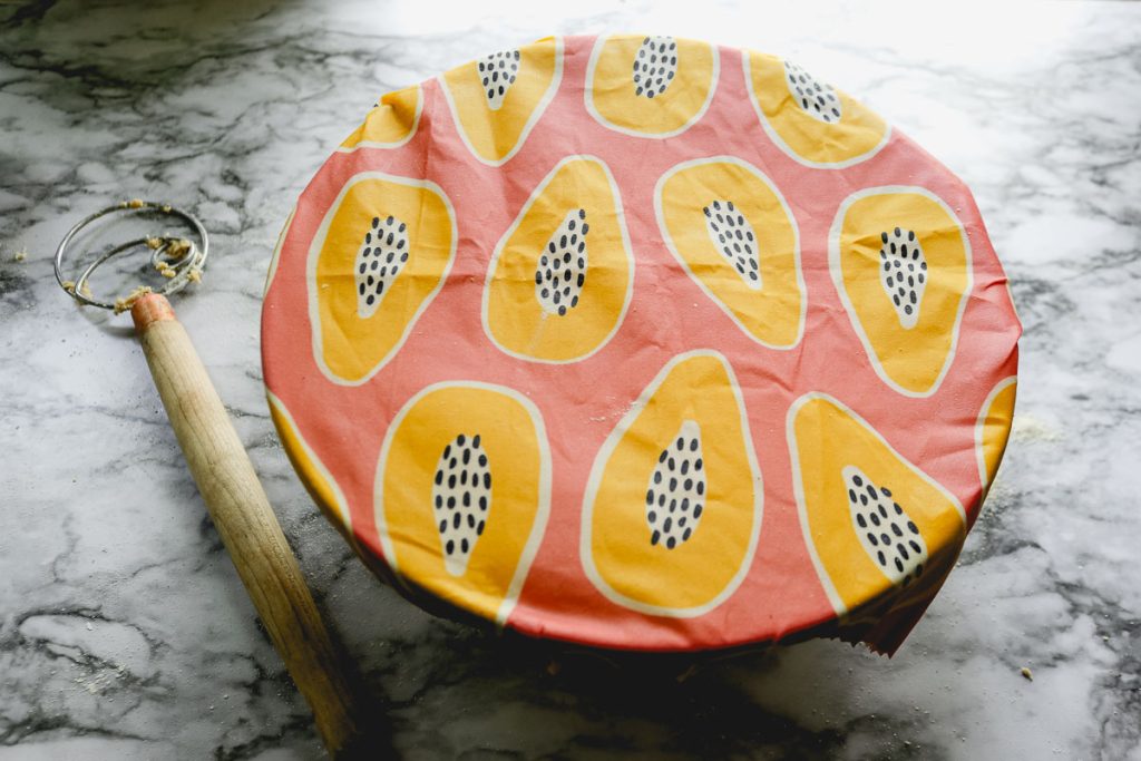 covered bowl with pink papaya beeswax cover