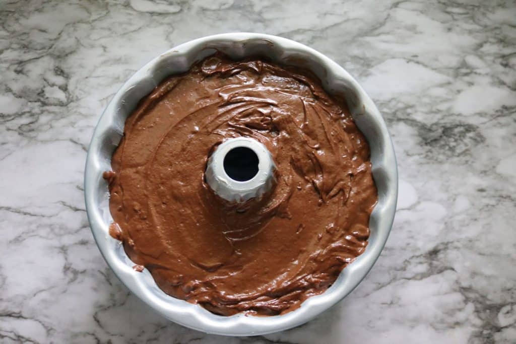 chocolate cake batter in a bundt pan