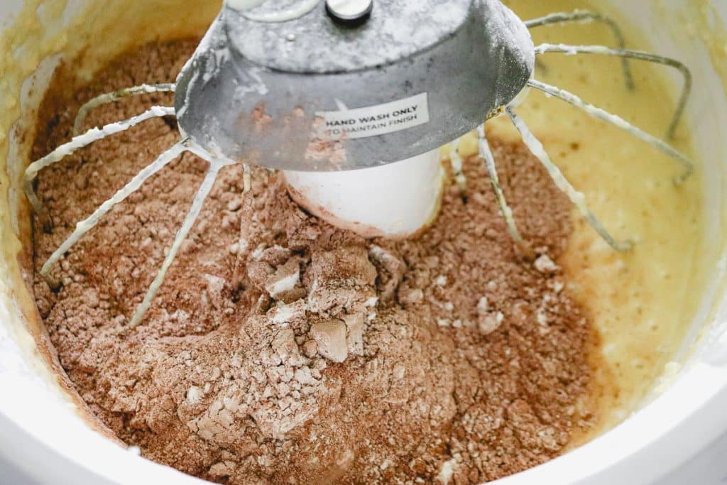 dry chocolate cake ingredients in a mixing bowls