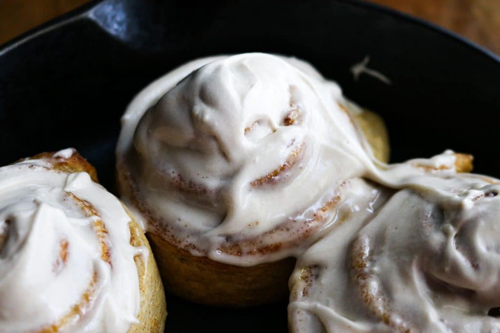 cinnamon rolls in a cast iron pan