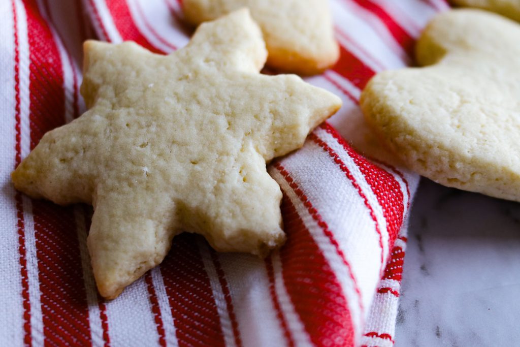 baked sourdough sugar cookies on a red and white towel