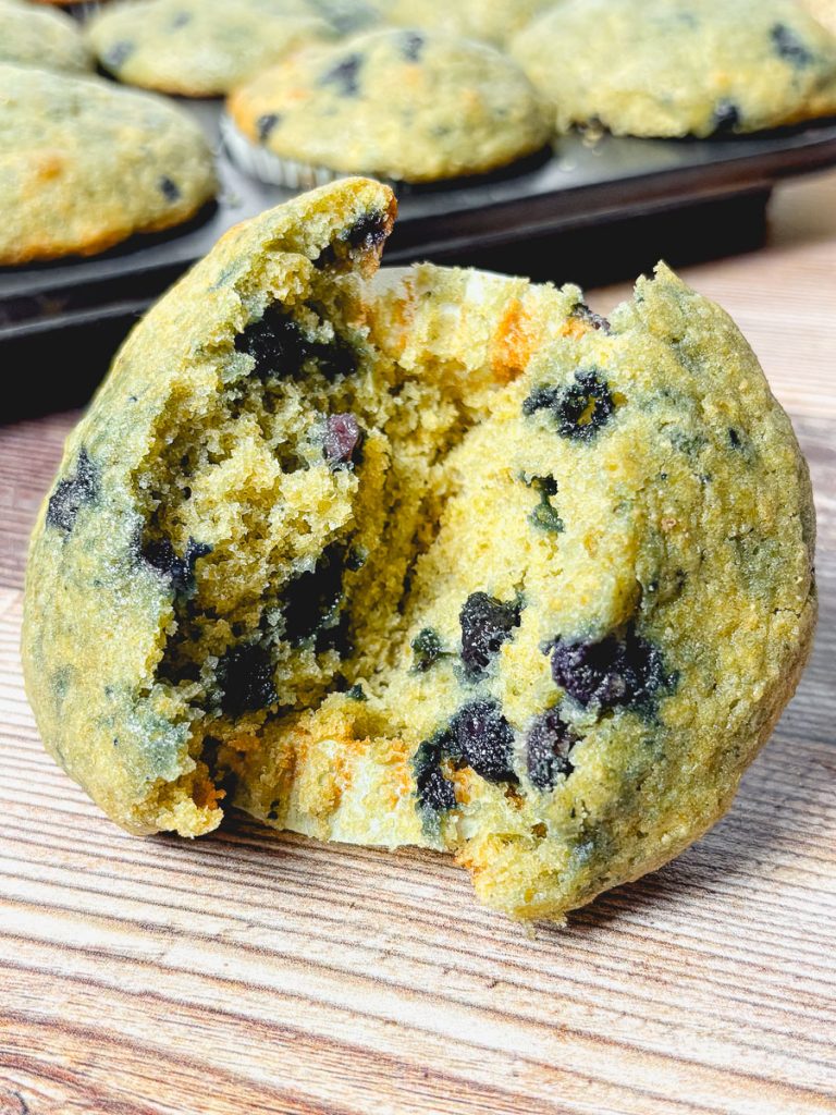 a split blueberry muffin to show the soft texture